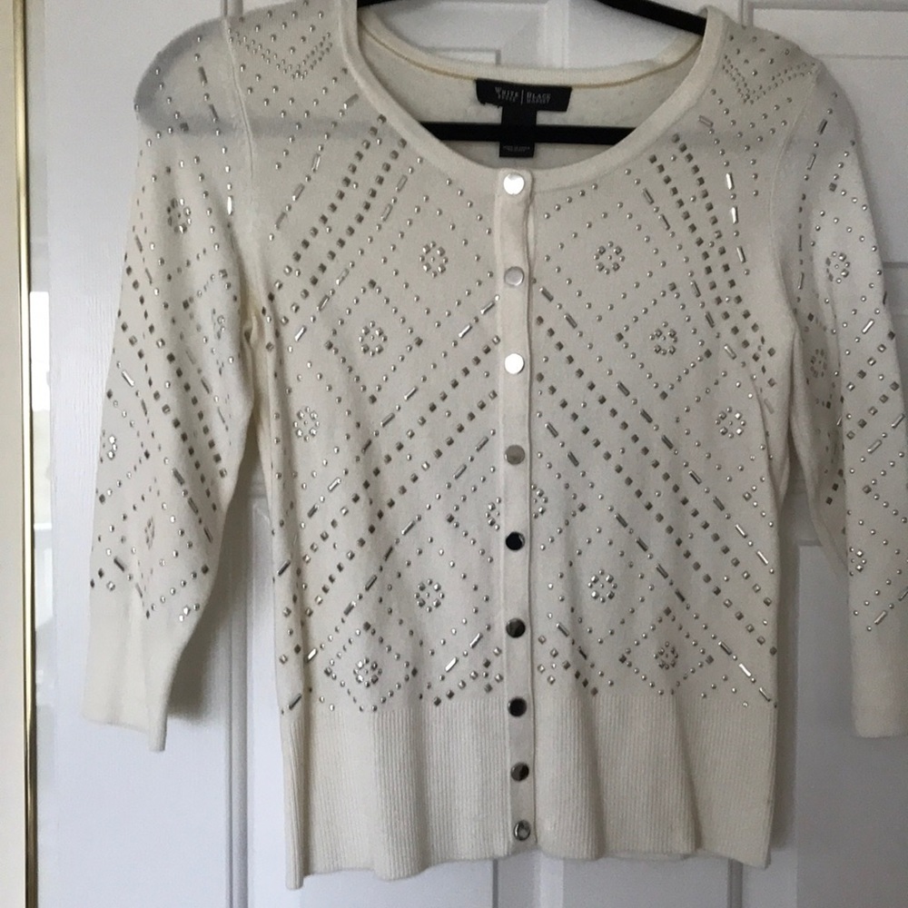 Off white embellished sweater with 3/4 sleeves.